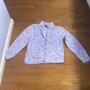 It’s a cheetah print sweater